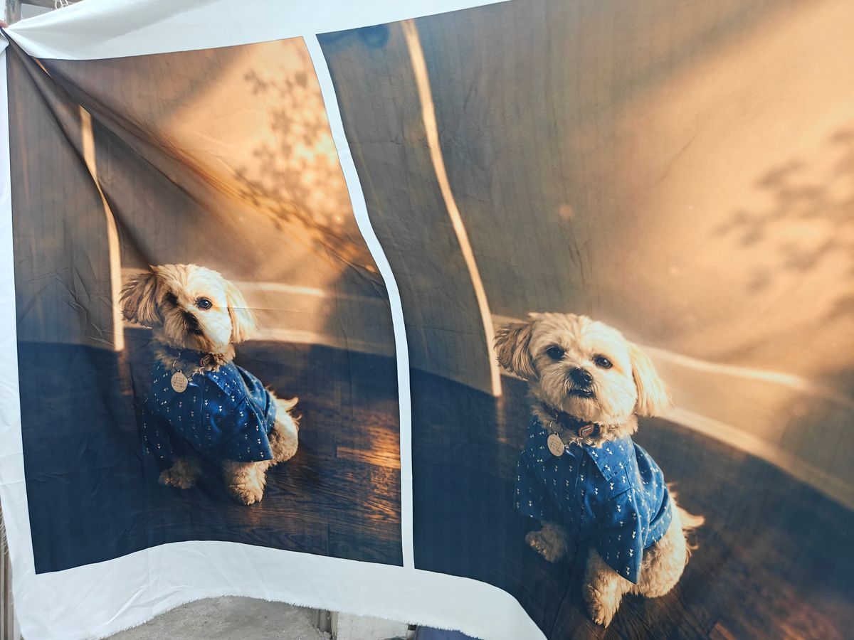 Custom printed suit lining featuring repeated personalized dog photos on satin fabric