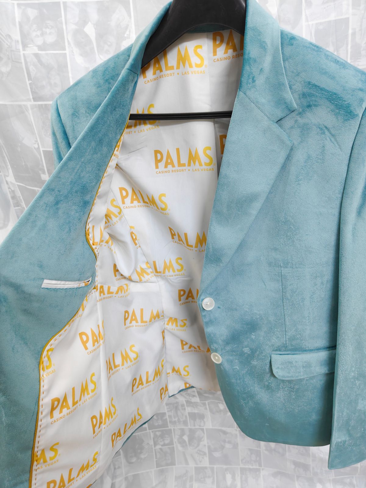 Light blue tailored blazer with custom white satin PALMS Las Vegas logo lining