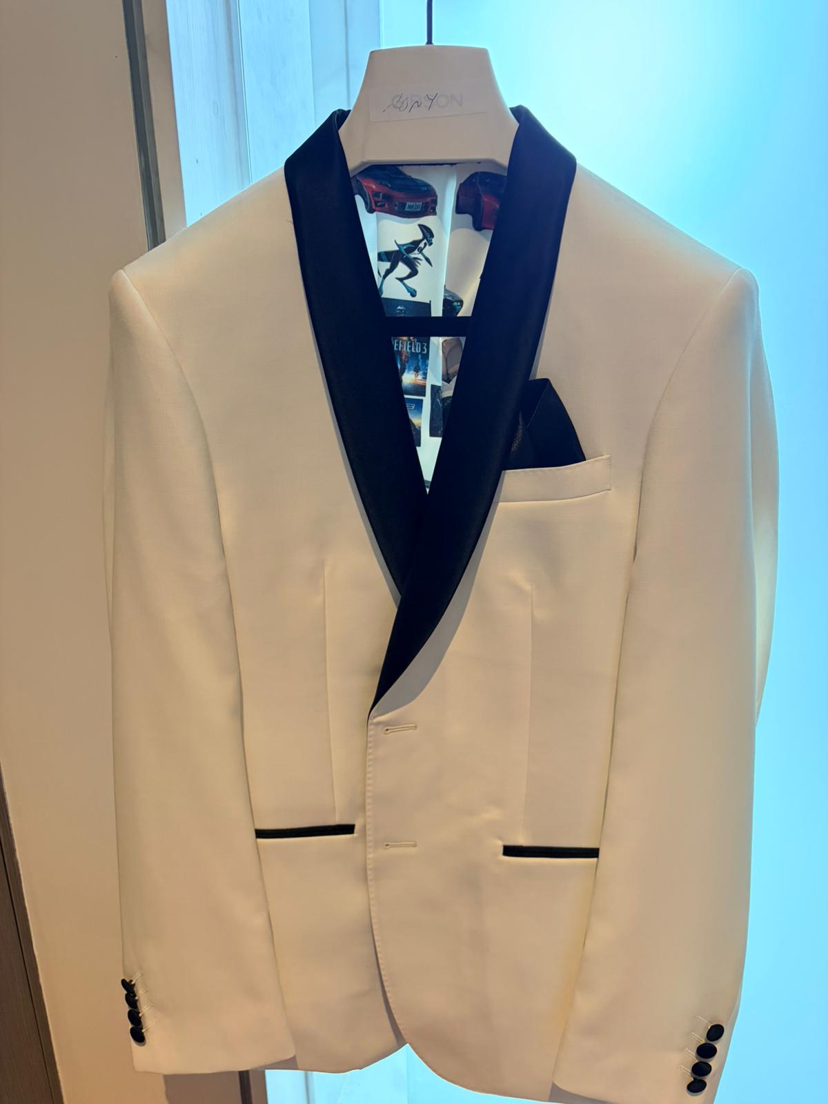 White tuxedo blazer with navy shawl lapels and personalized photo lining